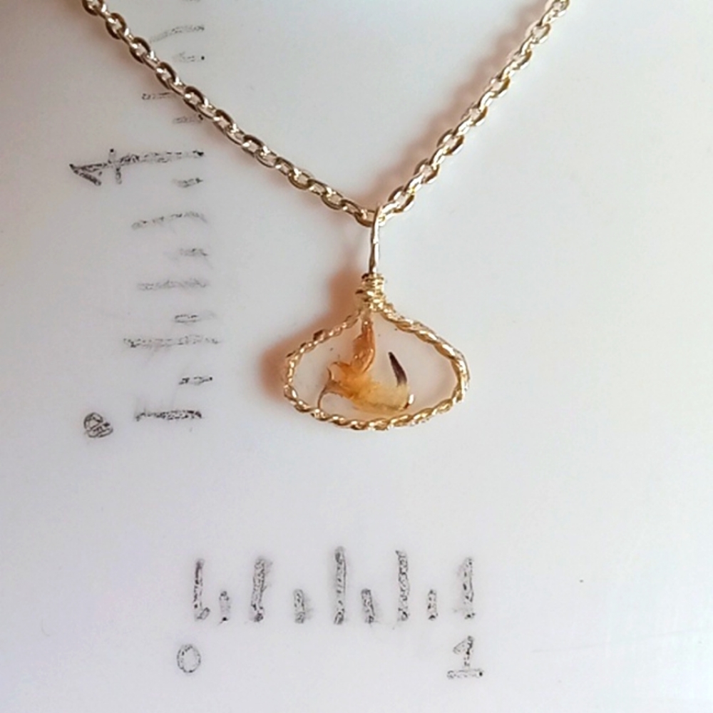 Floral necklace, amulet